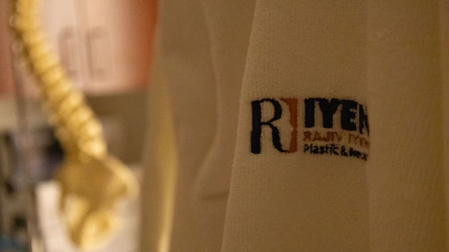 Lifestyle shot of Dr. Iyengar's coat hung up in a consultation room